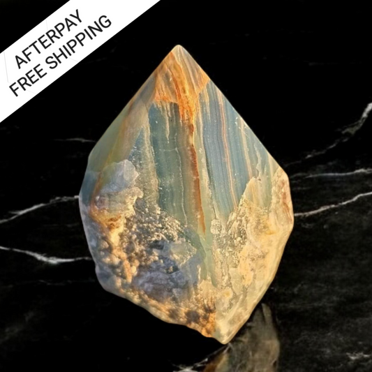 Blue Onyx polished point base cut